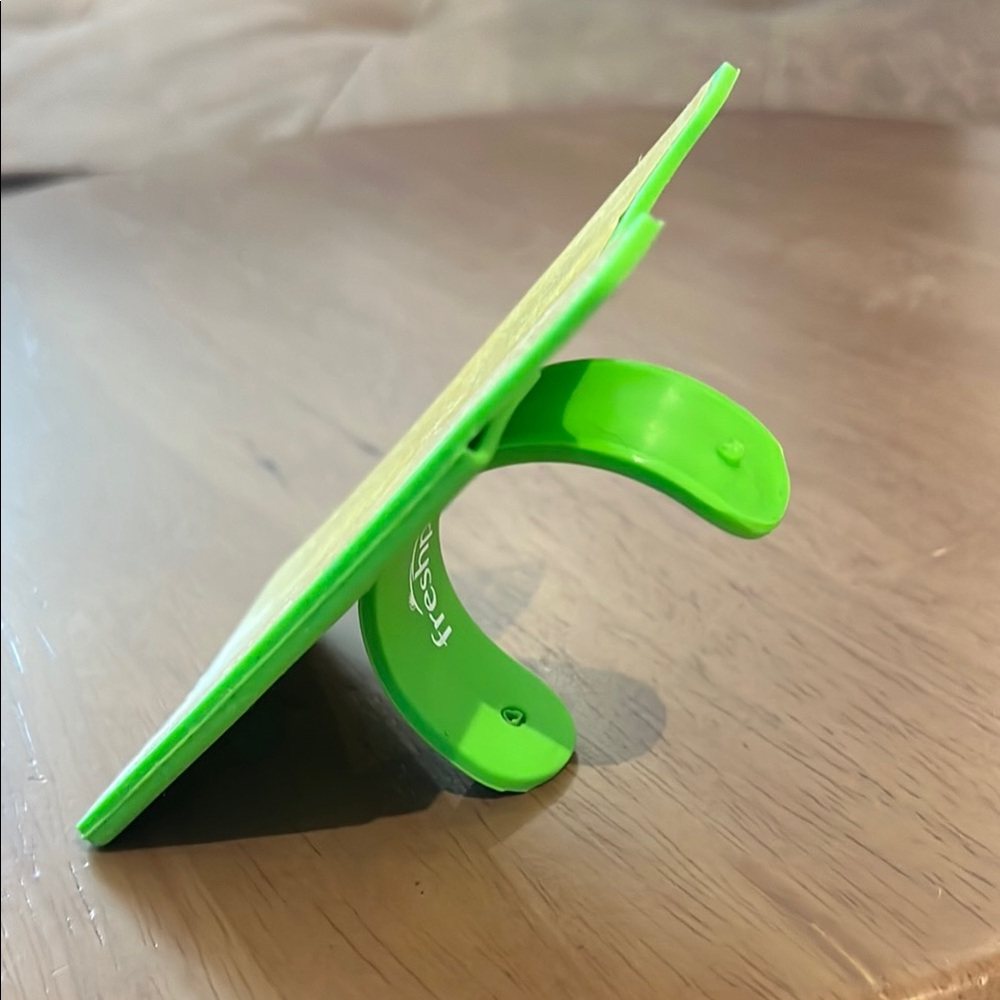 Adhesive Green Phone Pocket/Stand with Modern Curved Design